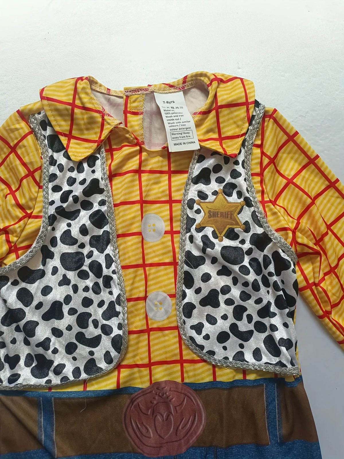 Boys western cowboy one-piece jumpsuit costume set matched with cowboy hat and red printed bandana, great for Halloween dress-up, carnival and themed party activities.